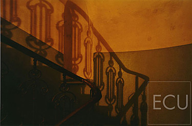 Color photo triptych of a stairs in shadow in Prague in the Czech Republic reflecting Prague's classical architecture