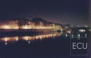 Color photograph and impressionistic view of Seine from Pont de l'Archevêché looking east toward Ile St. Louis in winter at night in Paris, France